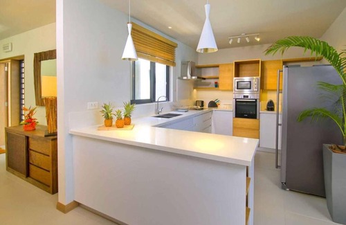 Pereybere Apartment | Amaranth I: Three bedroom beach apartment with rooftop pool