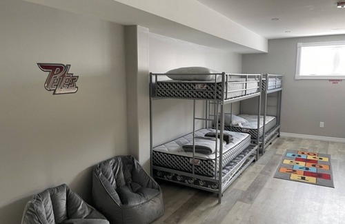 Selwyn House | Amazing custom home with with it's own all season hockey rink.