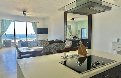 El Tezal Condo | Amazing Luxury Rooftop Condo with Arch Views