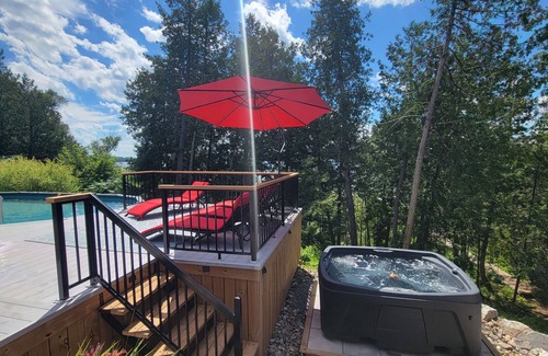 Messines Cottage | Amazing Resort like vacationing! Waterfront, pool, hot tub, and tonze of relaxin