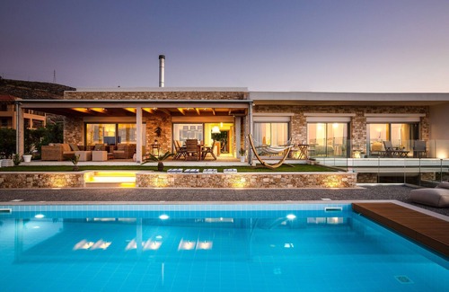Kokkini Chani Villa | Amazing Sea View with a heated covered pool