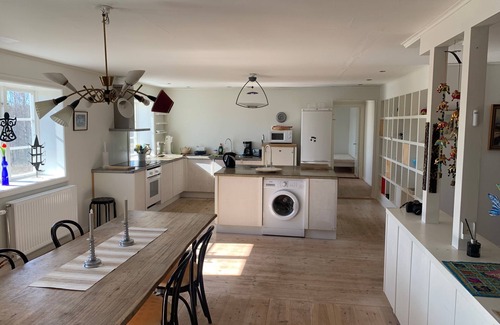 Jadraas Apartment | An apartment with generous space for socializing with family and friends.