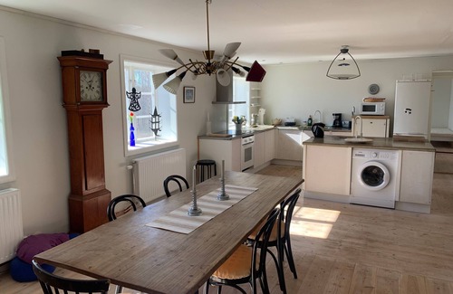 Jadraas Apartment | An apartment with generous space for socializing with family and friends.