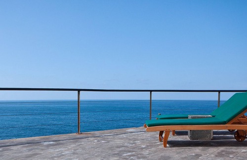 Las Aguas House | Antique cottage first row on the waterfront.