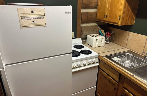 Nacogdoches Cabin | Antlers - An authentic log cabin experience in the forest at Stag Leap Cabins!