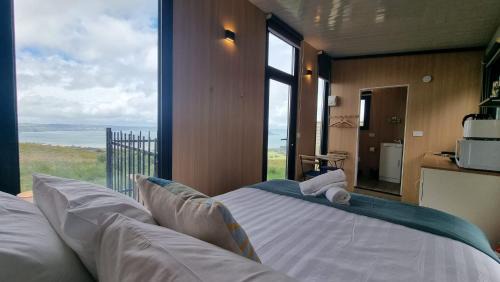 Kawaha Point House | Aorangi Peak Cabins 6 by Tiny Away