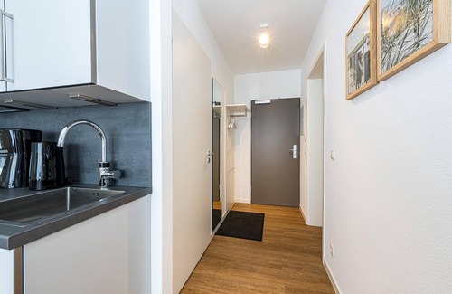 Bensersiel Apartment | Apartment Nahe der Nordsee mit Terrasse, Parkplatz, Schwimmbad- & Saunanutzung