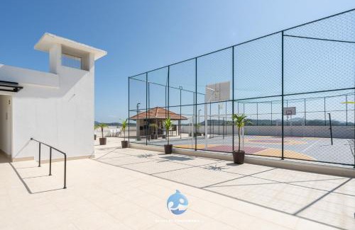 Nossa Senhora da Paz Apartment | Apartamento 150m da PRAIA com SACADA, WI-FI AR CONDICIONADO, PISCINA, PORTARIA 24h, PLAYGROUND e vaga de GARAGEM
