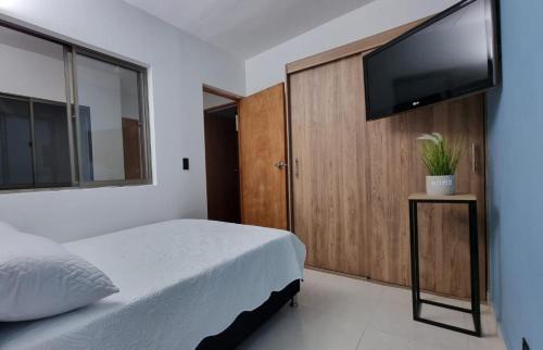 La Candelaria Apartment | Apartamento azul en Medellín