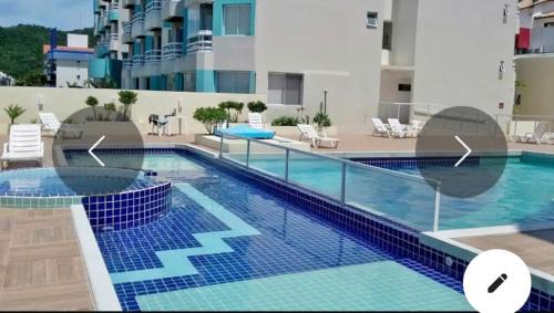 Ingleses Norte Apartment | Apartamento Maravilhoso, completo,1 quarto com cama queen e sofa retratil, bi cama embutida, colchao extra, vista pro mar, dormem 5, pé na areia, jacuzzi, piscina wifi,Self Checkin, automatizado