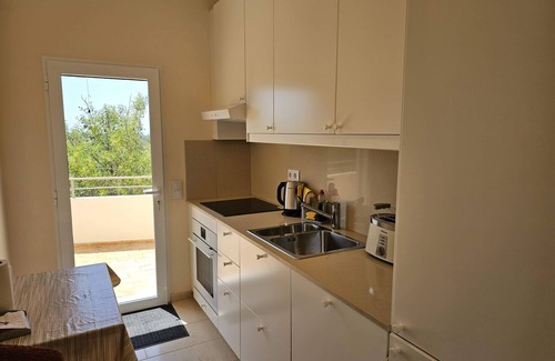 Paraiso Condo | Apartamento no 1º Andar em Moradia no Campo