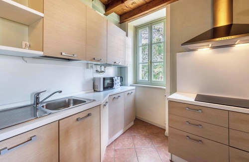 San Felice del Benaco Apartment | Apartment 'Antica Torre Petrarca' with Mountain View, Wi-Fi and Air Conditioning