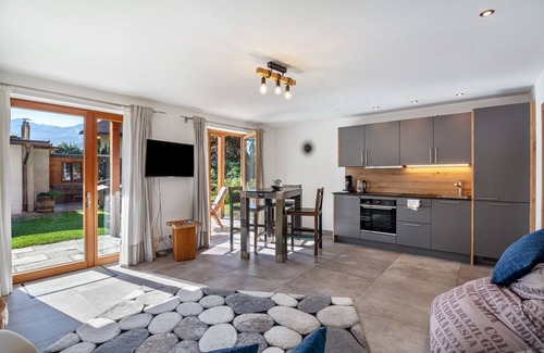 Sonnenbichl Apartment | Apartment 'Ferienwohnung Pflegersee' with Mountain View, Private Terrace and Wi-Fi
