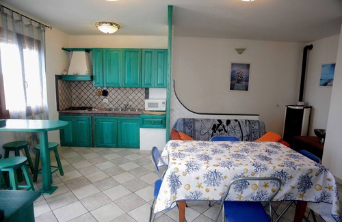 Calasetta Apartment | Apartment "Al Porto Calasetta" with Sea View, Shared Terrace & A/C
