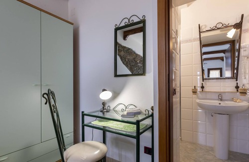 Sassari Apartment | Apartment "App 4 Posti con Terrazza Vista Mare" with Sea View, Pool, Wi-Fi, Garden & Terrace
