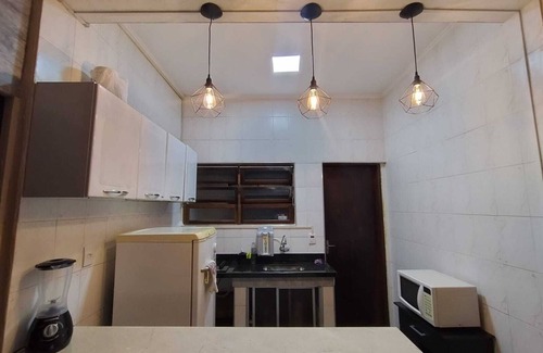 Centro Apartment | Apartment in the center of Bertioga, close to the ferry and next to the river for fishing.