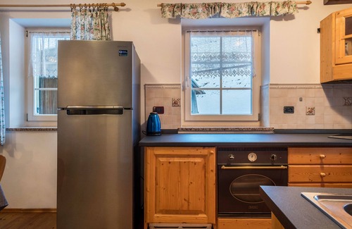 Vigo di Fassa Apartment | Apartment 'Casa Delmarco' with Private Terrace and Private Garden