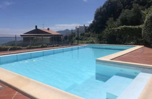 Ranzi Apartment | Apartment "Casa Santi Appartamento Olivo" with Sea View, Shared Pool & Wi-Fi