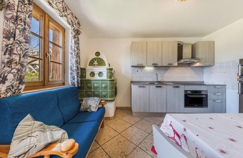 Vigo di Fassa Apartment | Apartment "Ciasa Sommavilla Calendula" with Mountain View, Shared Garden & Wi-Fi