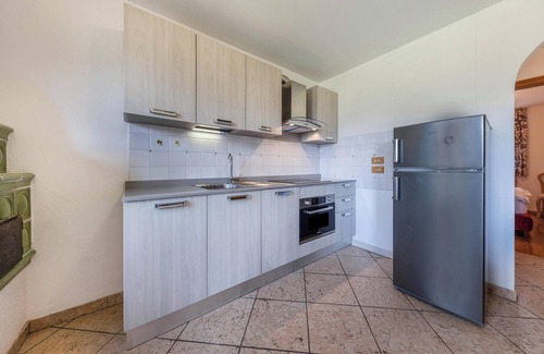 Vigo di Fassa Apartment | Apartment "Ciasa Sommavilla Calendula" with Mountain View, Shared Garden & Wi-Fi