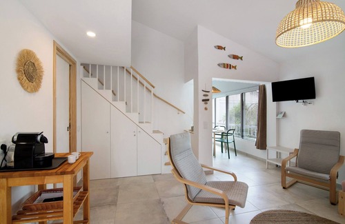 Santa Luzia Apartment | Apartment 'Cosy Beach Loft Pedras Del Rei' with Shared Pool, Wi-Fi and Air Conditioning