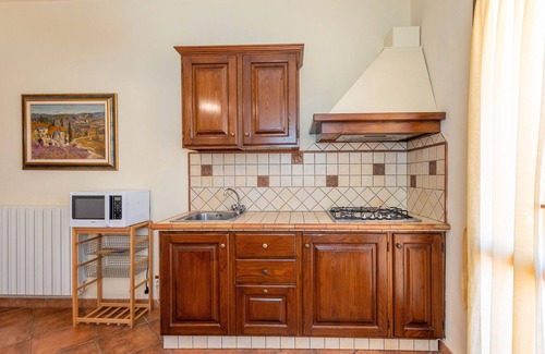 Livorno Apartment | Apartment 'Erba Di Campo - Viola' with Shared Pool, Private Terrace and Wi-Fi