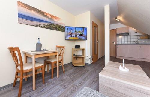 Esens Cottage | Apartment Föhr - Pension Nordkap in Bensersiel