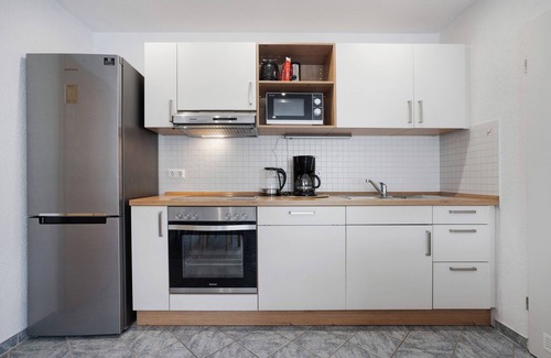Groskoschen Apartment | Apartment 'Ferienwohnung Zur Kirche' with Shared Garden and Wi-Fi