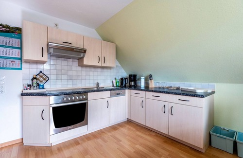 Niebuell Apartment | Apartment 'Ferienwohnung Wellenreiter' with Shared Terrace, Shared Garden and Wi-Fi