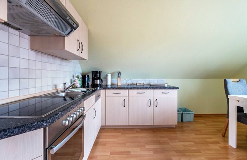 Niebuell Apartment | Apartment 'Ferienwohnung Wellenreiter' with Shared Terrace, Shared Garden and Wi-Fi