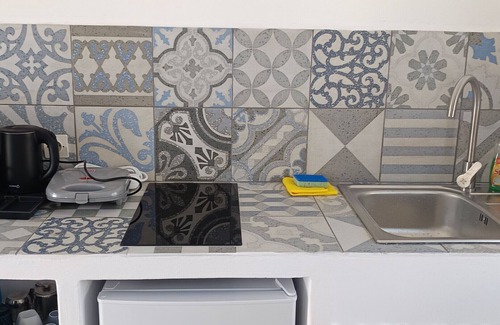 Grikos House | Apartment In A Hotel "Pico Bello Patmos 30" with Sea View, Private Terrace & Wi-Fi