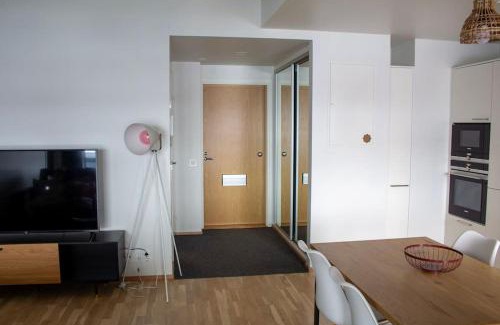 Keskinen District Apartment | Apartment in Konepaja with private sauna and a large balcony