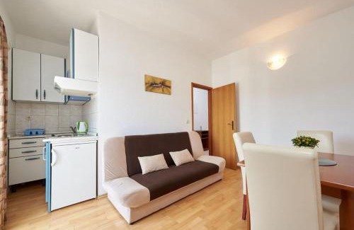 Seget Vranjica Apartment | Apartment in Seget Vranjica with sea view, balcony, air conditioning, WiFi 5052-3