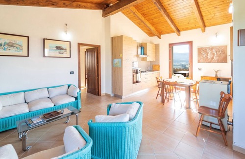 Perfugas House | Apartment in Villa “Immersa Nella Natura” with Views, Private Terrace, Shared Pool & Wi-Fi