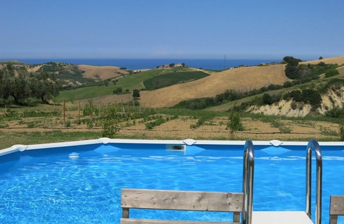Cologna Spiaggia Villa | Apartment in villa with WIFI, hot tub, A/C, pool, TV, patio, pets allowed, panoramic view, parking