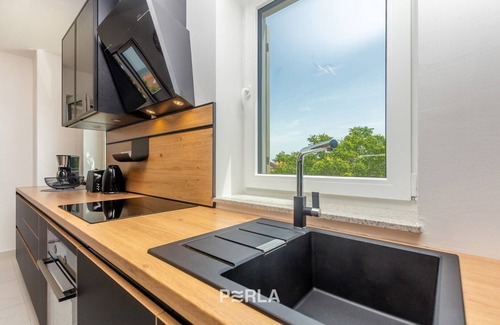 Nerezine Apartment | Apartment NAYA with large heated pool 50m2