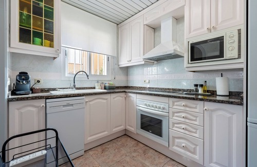 Comarruga Apartment | Apartment 'Near Beaches Large Private Patio' with Shared Pool, Wi-Fi and Air Conditioning