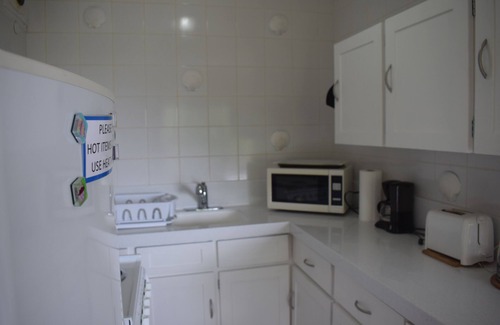 Sunset Crest Apartment | Apartment On Beautiful Grounds With Large Swimming Pool Near Beach