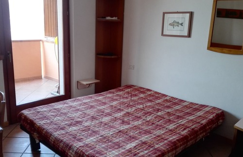 Assenza Apartment | Apartment surrounded by olive trees with a terrace overlooking Lake Garda