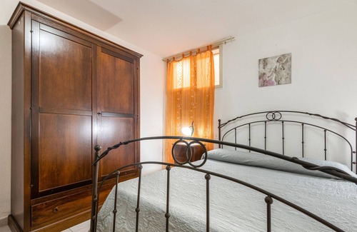 Quartu Sant'Elena Apartment | Apartment "Villa Gianna - Toscano" with Private Terraces, Shared Garden & Wi-Fi