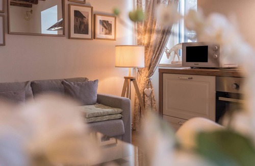 Levico Terme Apartment | Apartment “Wellness Lodge Edoardo” with Lake and Mountain View, Whirlpool & Sauna