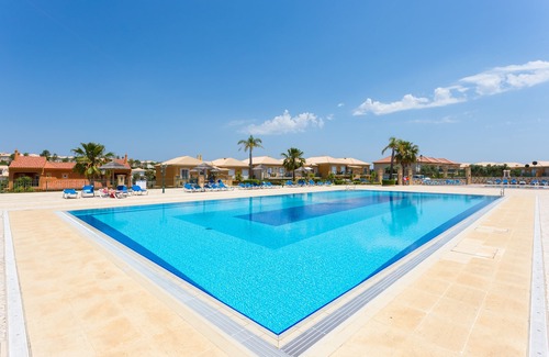Atalaia Apartment | Apartment with heated communal pool, golf view, sky sport channels, and spa acce