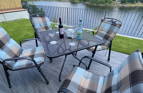 Saaldorf Condo | Apartments-Saaldorf WG1 with terrace and view of the reservoir
