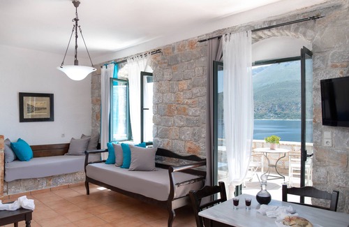 Karavostasi House | Aphrodite - traditional stone built studio apartment