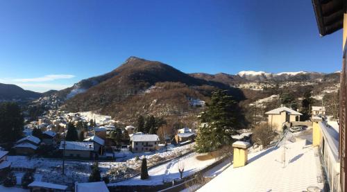 Asso Apartment | Appartamento Al Canelino - Como Lake and Mountains