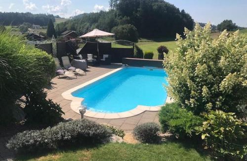 St. Antoni Apartment | Appartement mit Alpensicht, beheiztem Pool, Garten