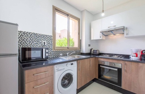 Menara Apartment | Appartement Pied Dans L'eau - Jardin Privée