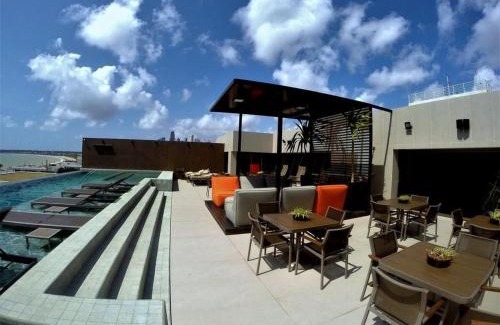 Tambau House | Apto com Vista Mar no Holanda's Prime