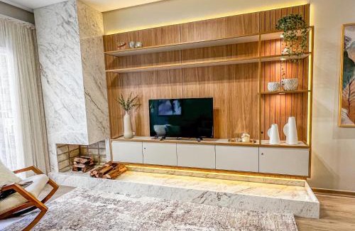 Carniel Apartment | Apto moderno com lareira, piscina aquecida e infra completo em Gramado