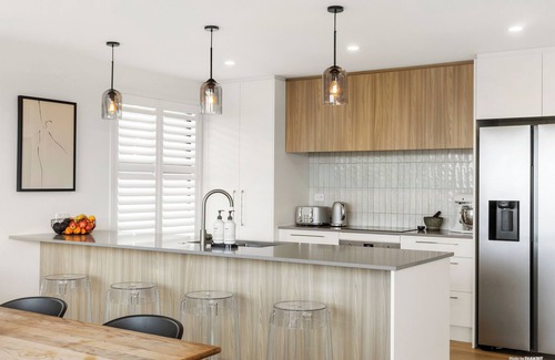 Te Atatu Peninsula House | Architecturally designed stunning trophy home with sea views, on a quiet street.